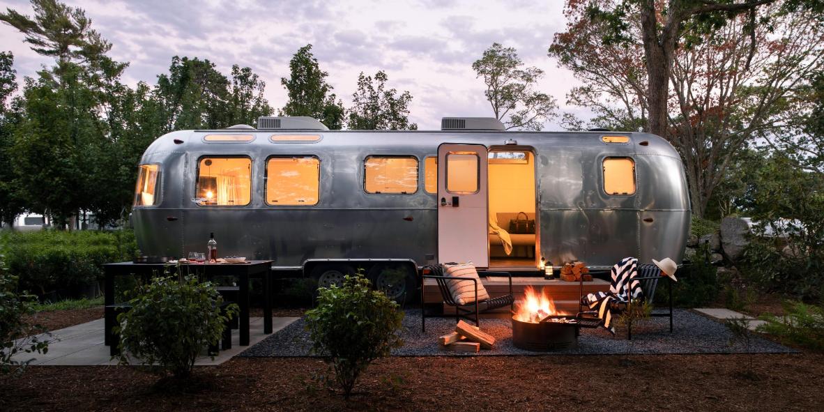 Vintage airstream suites surrounded by nature