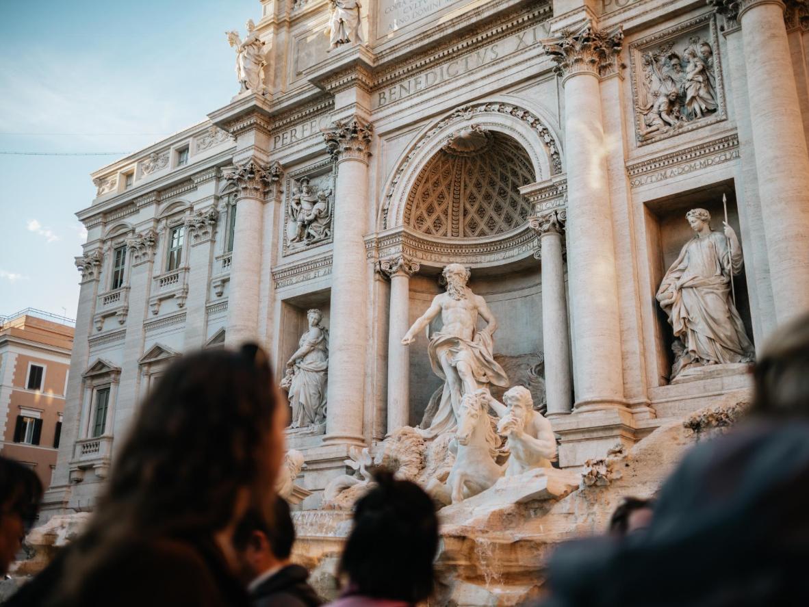 Admire Nicola Salvi’s awe-inspiring Baroque masterpiece, the Trevi Fountain
