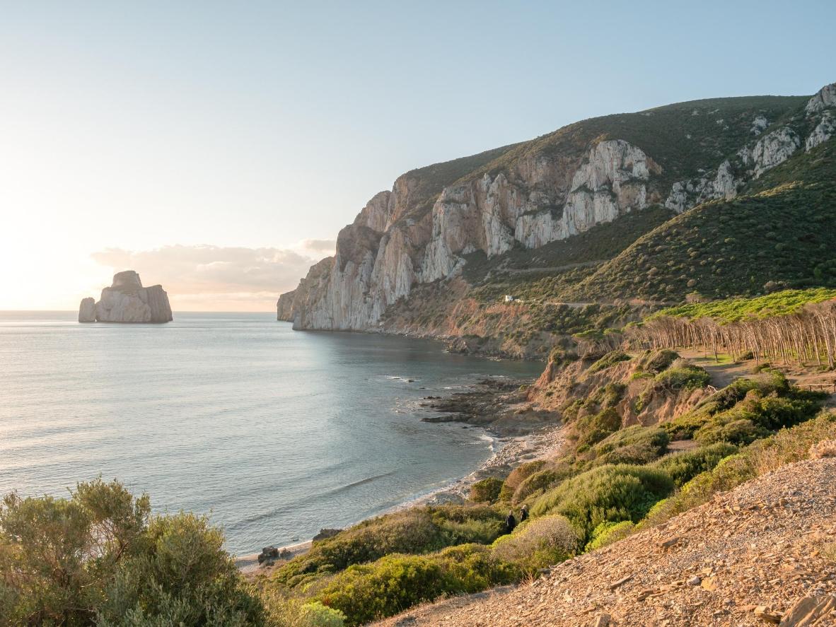 Hike Sardinia's coastline for an amazing view of the rock formation of Pan di Zucchero