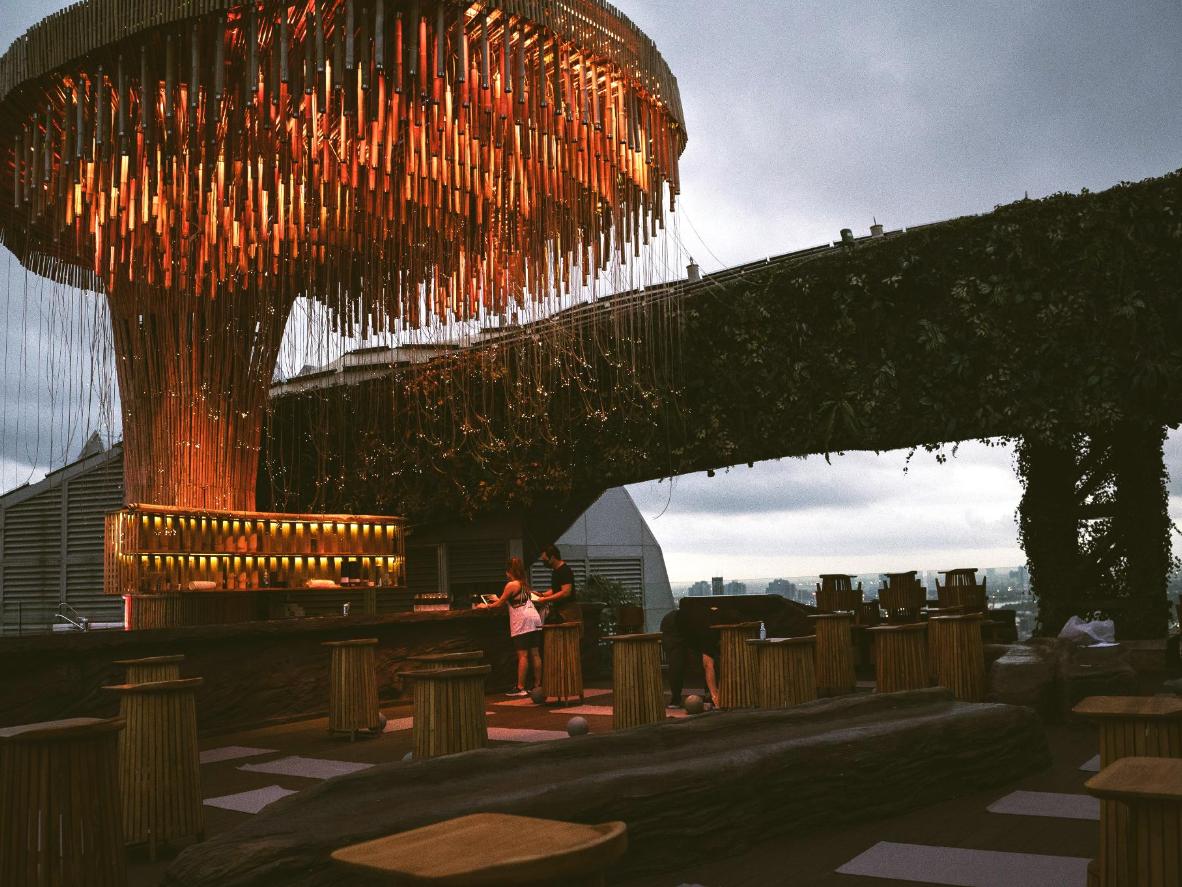 Admire the Avatar-esque artificial tree at Tichuca Rooftop Bar