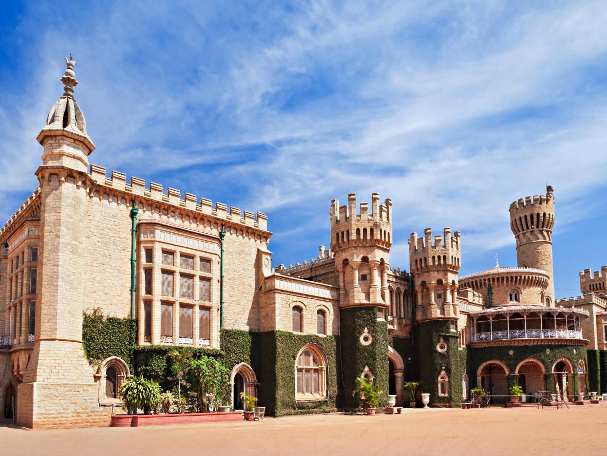 Visit Bangalore Palace to admire its grand turrets, towers and surrounding gardens