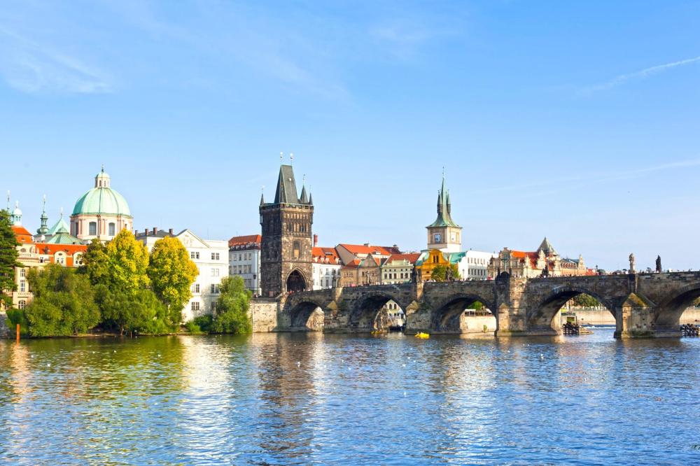 Charles Bridge in Prague, Czech Republic with a blue sky in the background