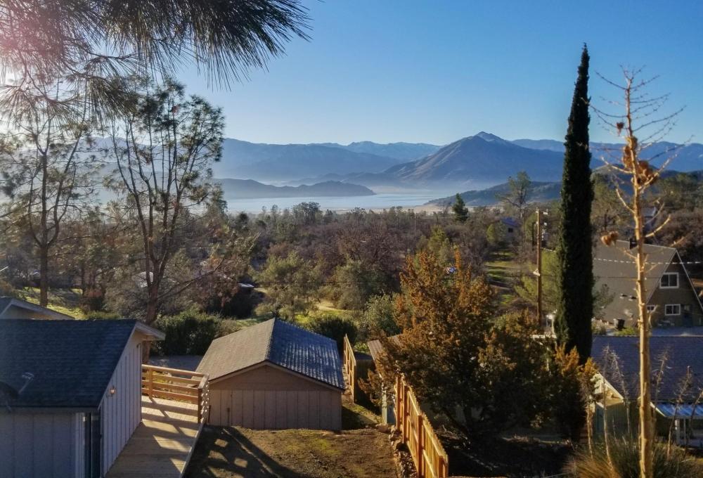 Stunning mountain view from a home in Wofford Heights, California, featuring a picturesque lake below.