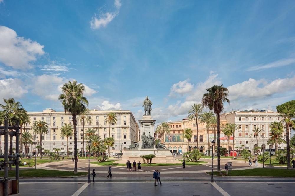 Traditional buildings stands prominently in the centre of Prati, Rome, surrounded by urban architecture and city life