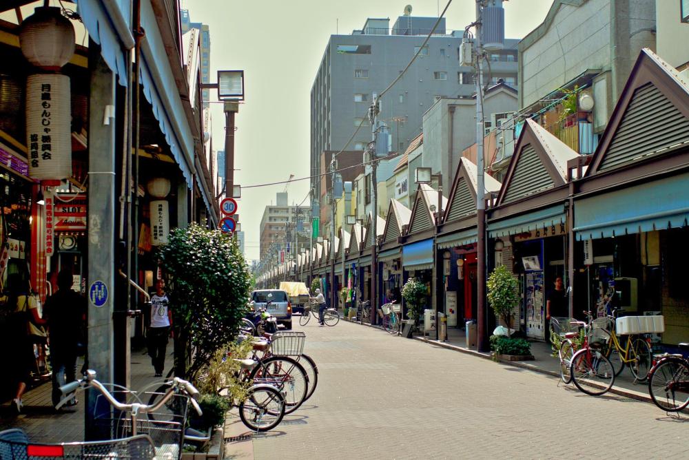 Embrace Tsukishima's charm by exploring its main street, Tsukishima Monja Street