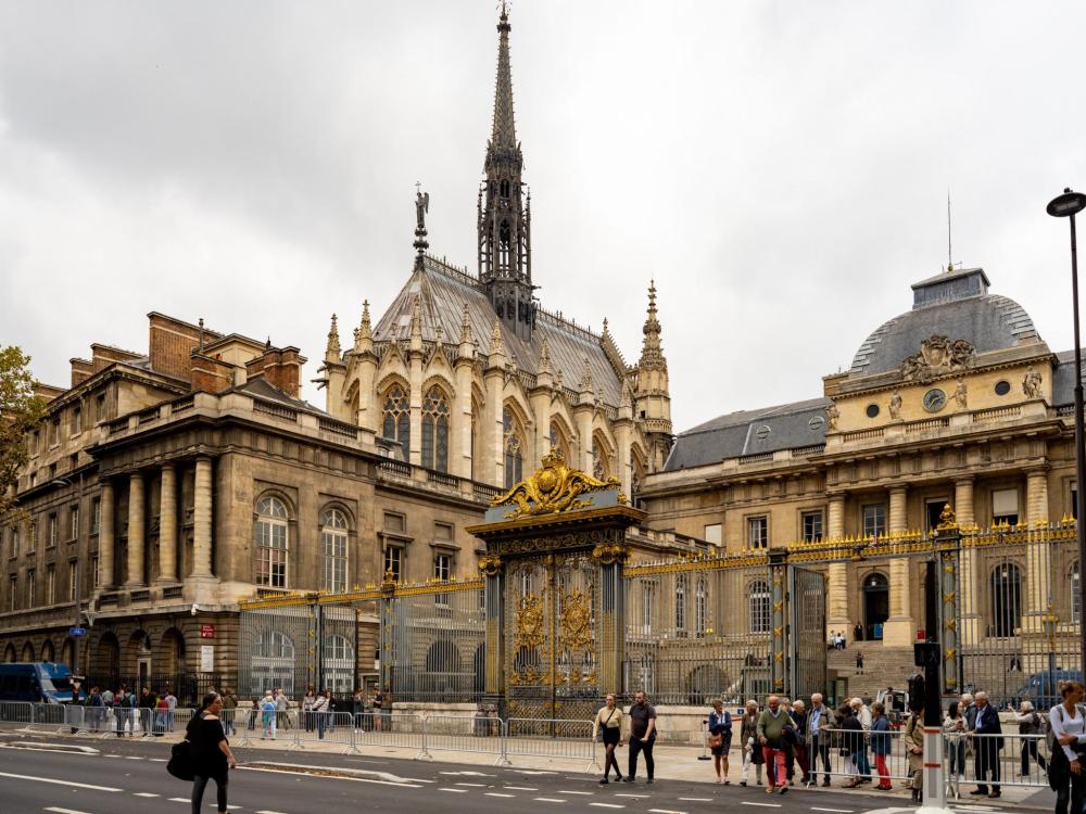 Ornate golden-roofed Sainte-Chapelle cathedral, a renowned Gothic landmark in Paris.