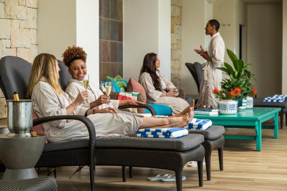 Gallery Detail: Women Relaxing In A Serene Spa Room At Santé Wellness