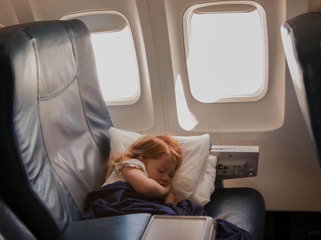 How to sleep on a plane: Expert tips from frequent flyers
