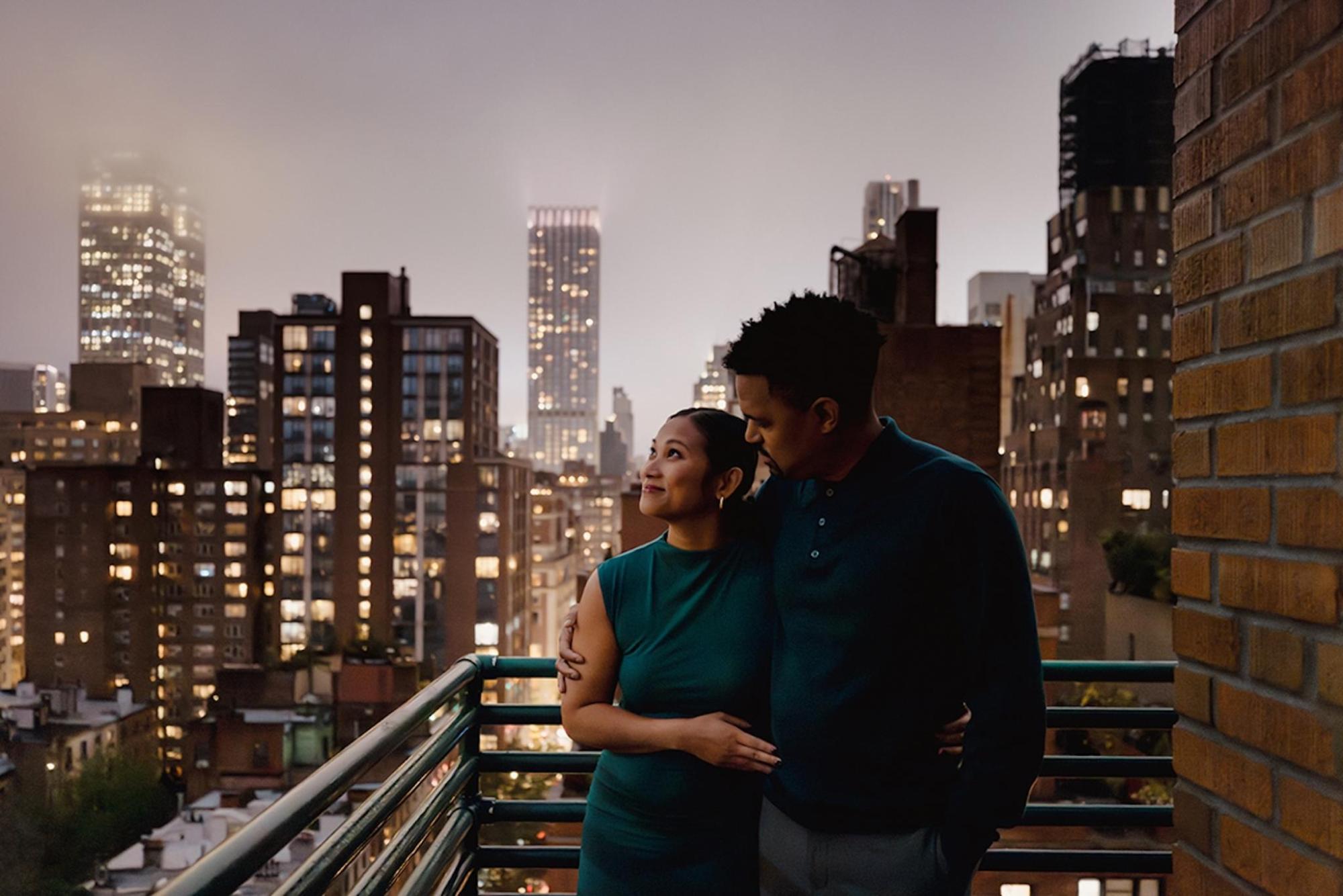 A couple embraces in a romantic pose in New York City