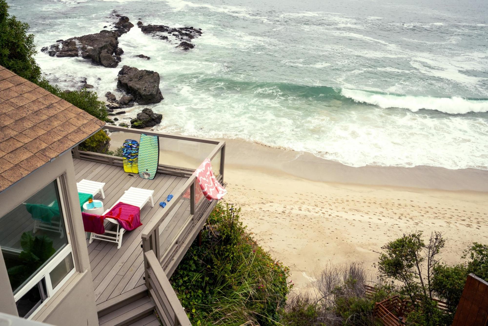 A stylish gray beach house, perfect for seaside getaways.