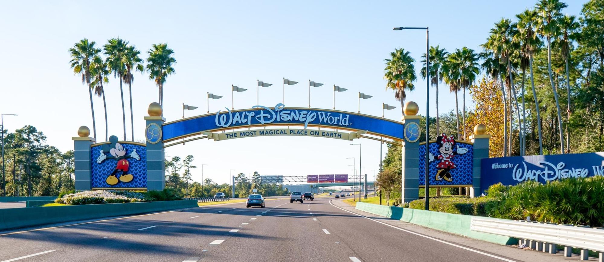 Disney World entrance with the iconic "Disney World" sign