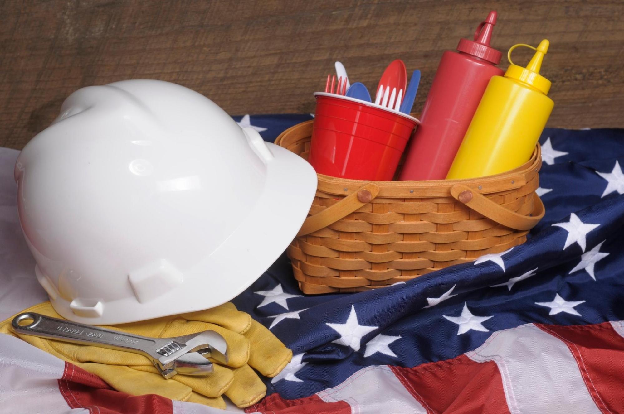 Hard hat, gloves, and condiments for a Labor Day picnic