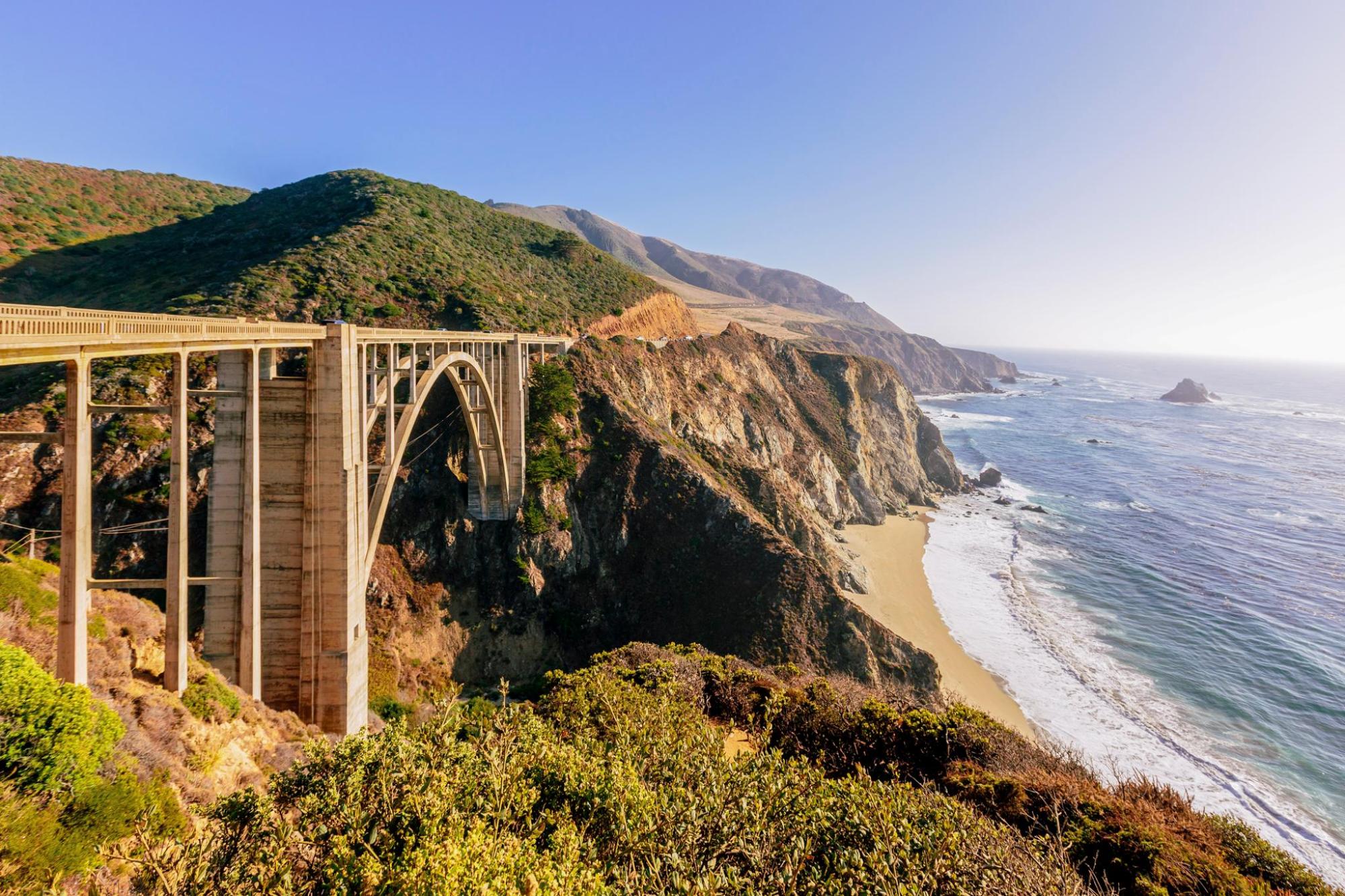  Scenic view of Bixby Bridge spanning over a coastline