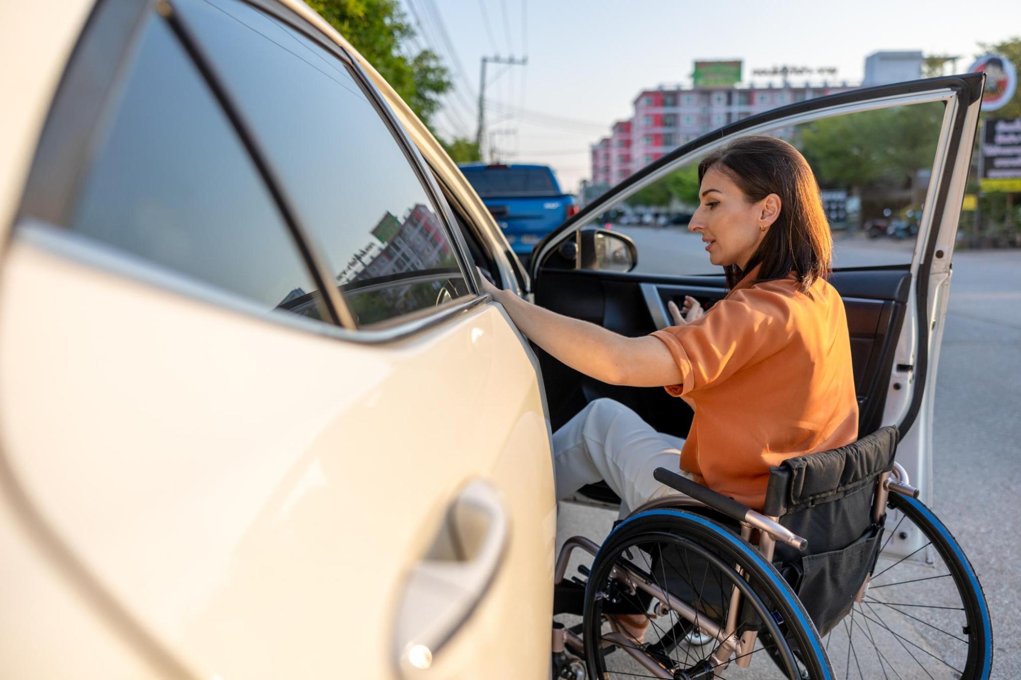 A woman in a wheelchair making the most of her car hire