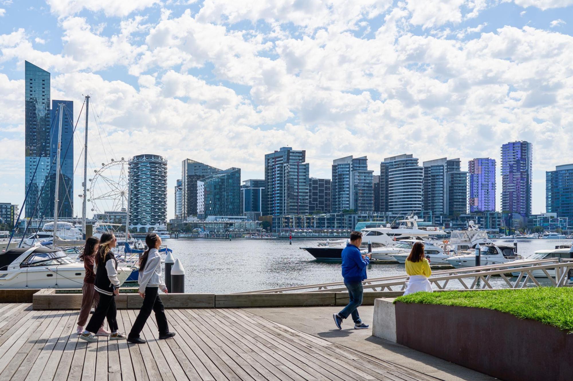 Melbourne Docklands skyline with marina and waterfront.