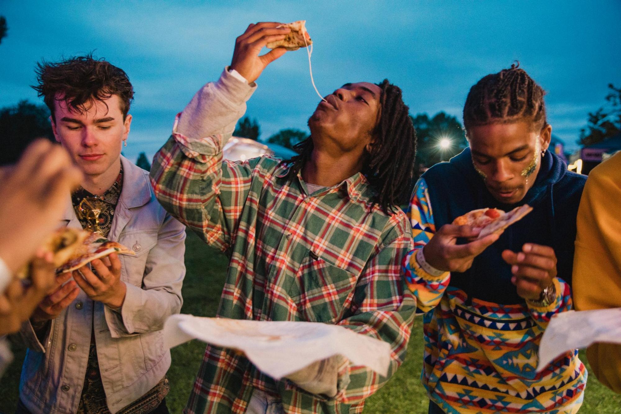 A group of people eating at a US summer solstice festival