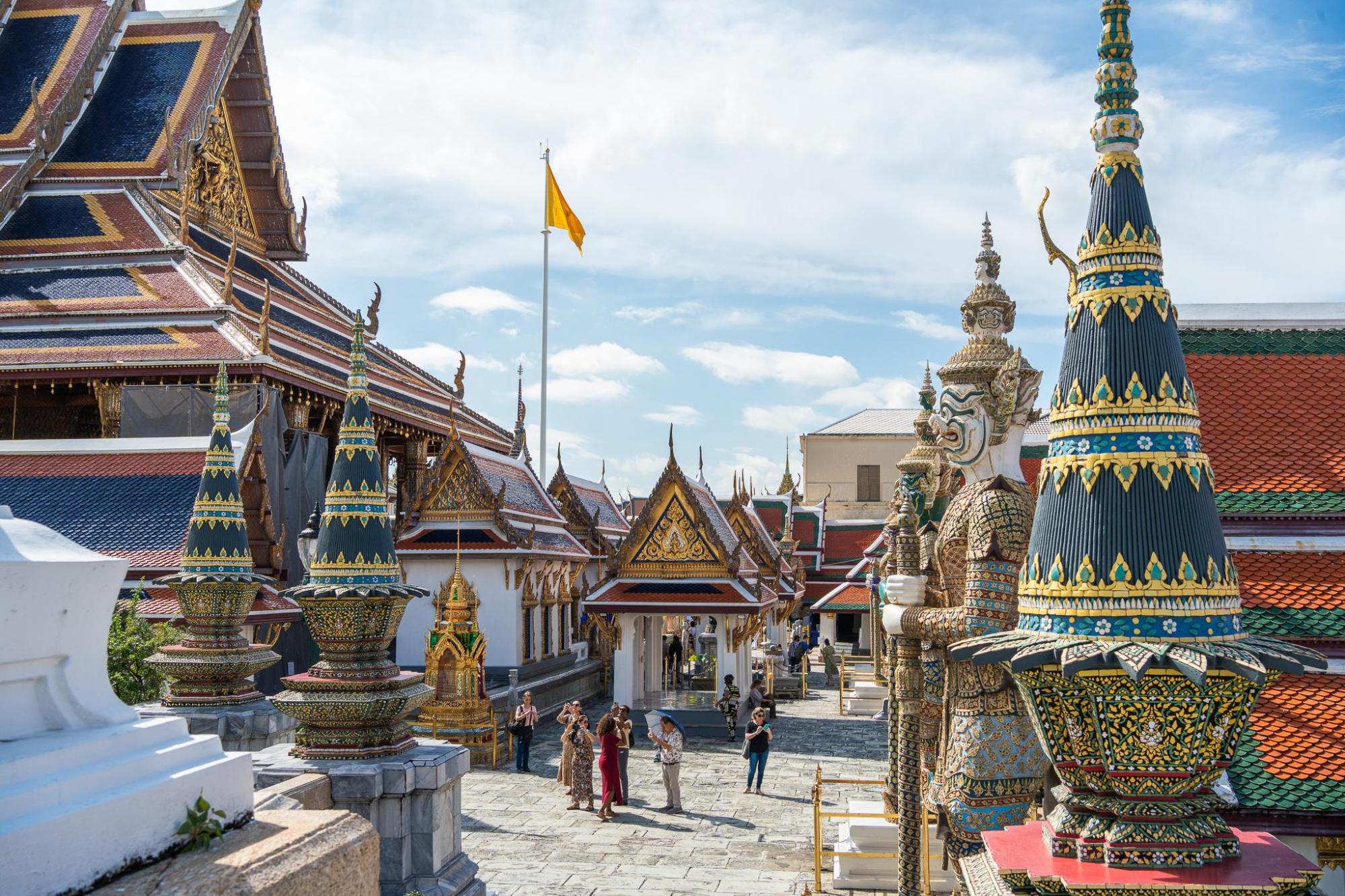 Visitors exploring Bangkok’s Grand Palace.
