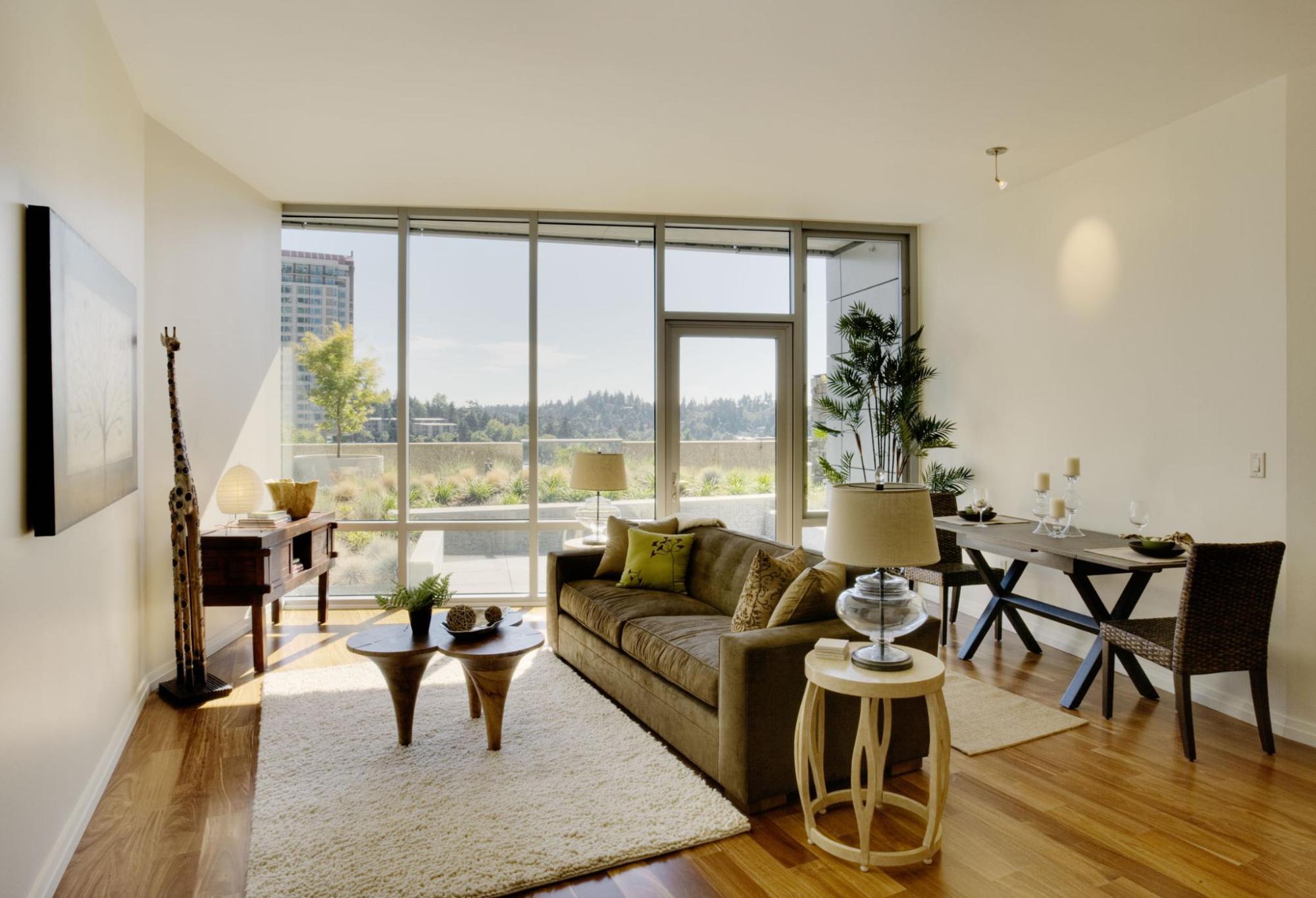 Cosy living room showcasing a couch a table and chairs 