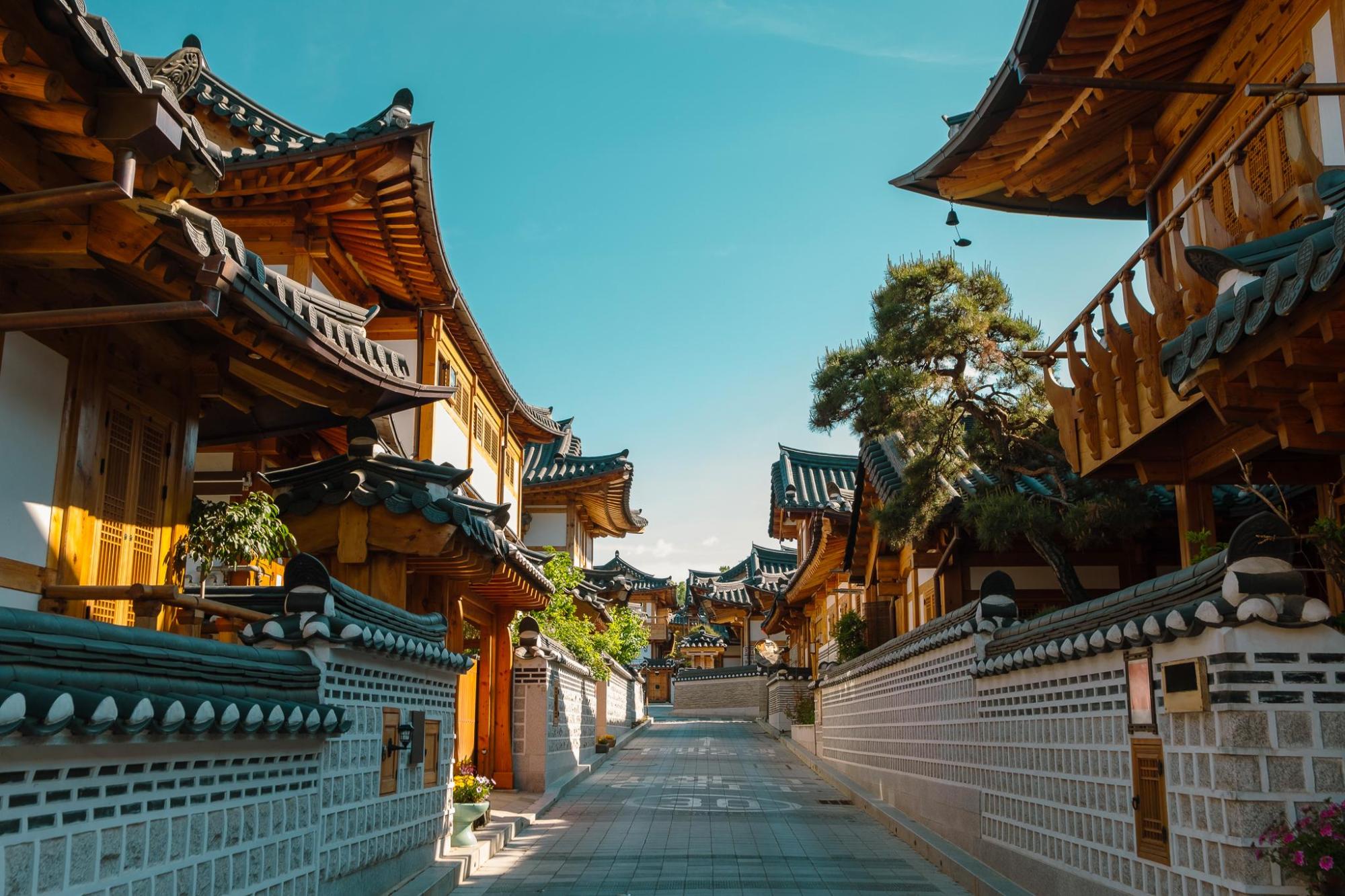 Traditional Korean houses along a quiet village street.
