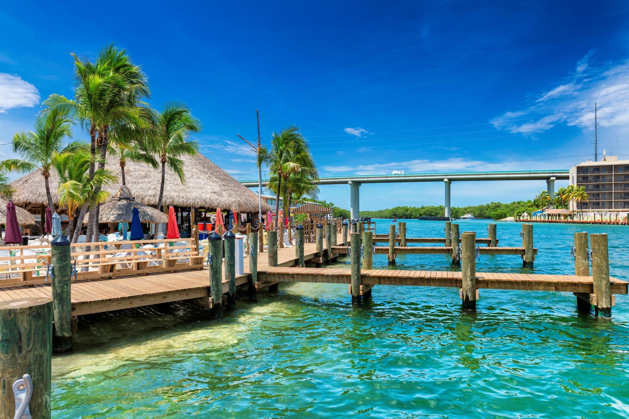 Waterfront restaurant and marina on a sunny tropical day