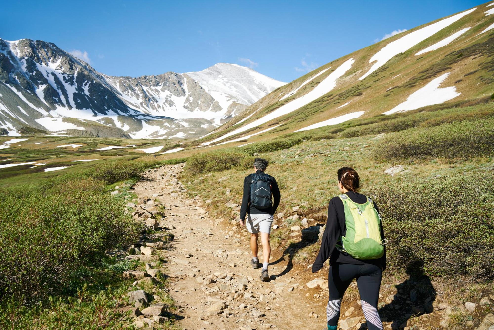 Hikers on an alpine trail in the Colorado Rockies.