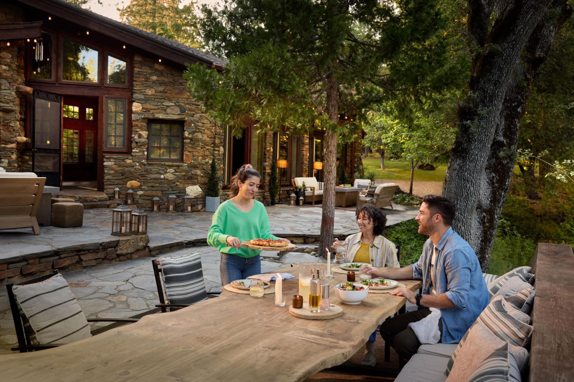Group of people gathered at a family dinner in a rural area