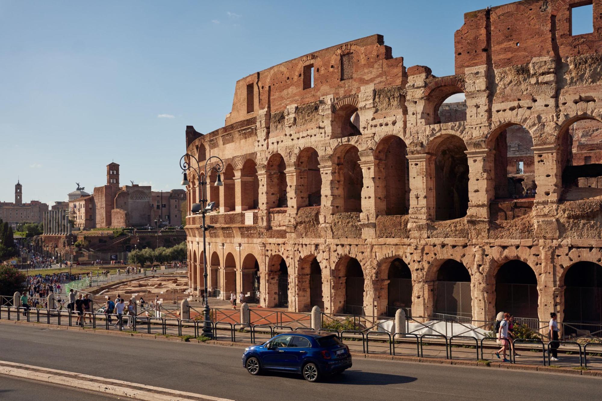 Ancient stone arches of the Roman Colosseum in Rome
